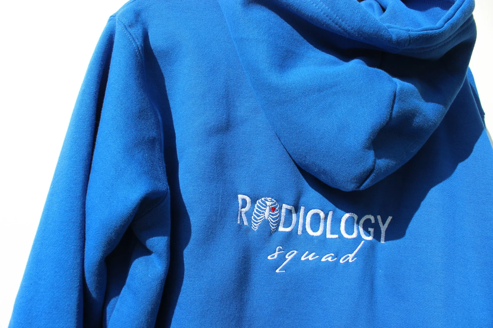 Felpa blu con ricamo Radiology Squad sul cappuccio